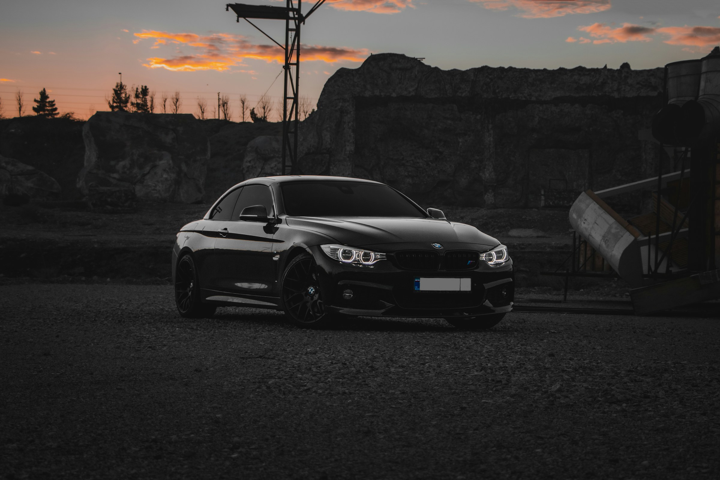 Sculpted bodywork and headlights of a premium car